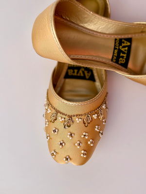 SITARAY – Golden Aura Khussa with Beaded Floral Embellishments and Marigold Accents